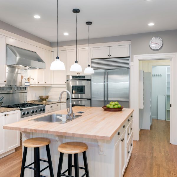 Luxury Kitchen Interior in white with wooden floor and kitchen i